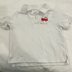 White monogrammed “Levi” firetruck polo size 18-24 months